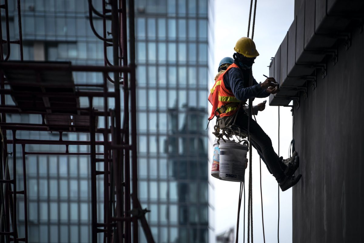 workers rappelling according to osha standards for fall protection