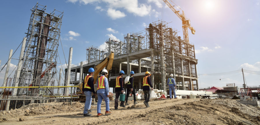 workers walking to a construction site